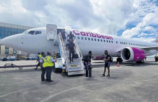 This image dated June 25, 2024, shows passengers disembarking from a Caribbean Airlines flight at Cheddi Jagan International Airport in Guyana. PHOTO COURTESY CJIA