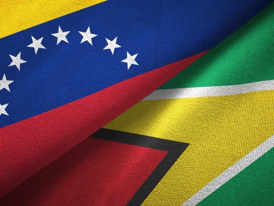 Venezuela and Guyana flags - 123RF