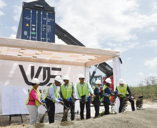 Prime Minister Dr Andrew Holness (centre) breaks ground for the $US80-million Westlands Expansion Project on Thursday with (from left) Shipping Association of Jamaica President Corah Ann Robertson Sylvester; Port Authority of Jamaica (PAJ) President and CEO Gordon Shirley; PAJ Chairman Alok Jain; Kingston Freeport Terminal CEO Jedrzej Mierzewski; Minister of Industry, Investment and Commerce Aubyn Hill; and CMA Terminals Holding Senior Vice-President Emmanuel Delachambre.