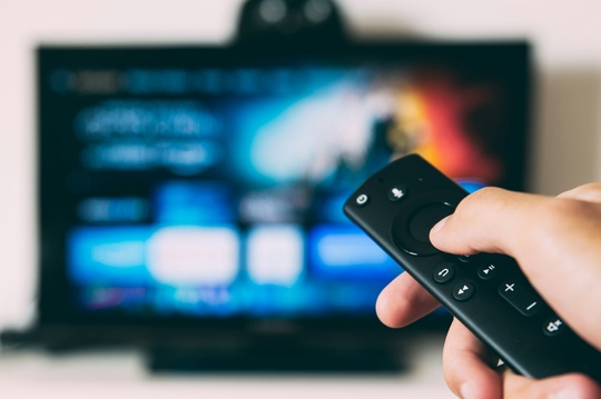 Telvision with remote - unsplash.com 