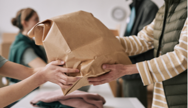 Person-Handing-Off-Bag