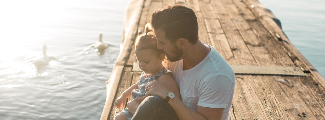Father and son on dock