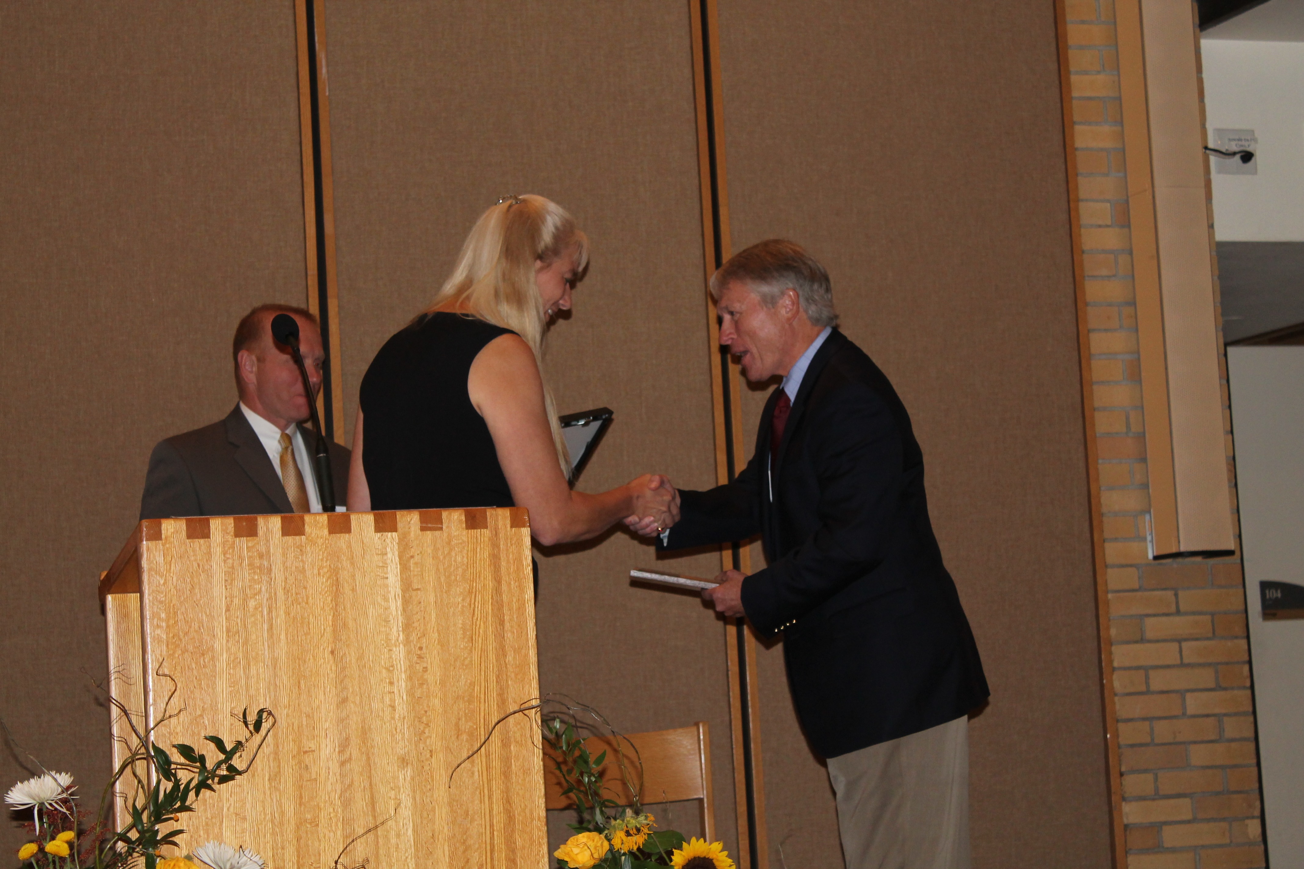Cynthia receiving an Award