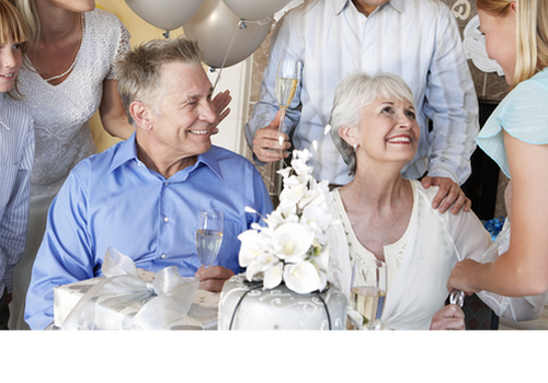 Older couple celebrating with family - goes to Life Events page