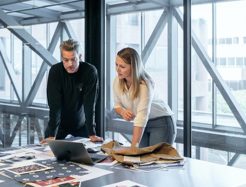 Man and women planning for their business in a new penthouse apartment 