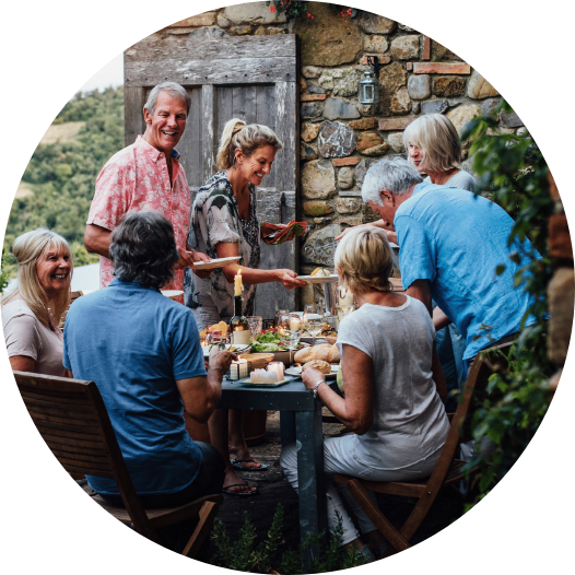 gathering of friends eating around a table