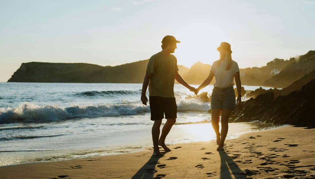 Couple walking on the beach