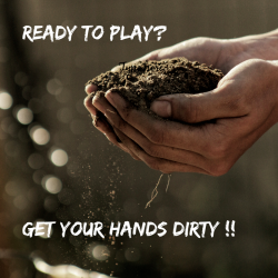 Cupped hands in dirt