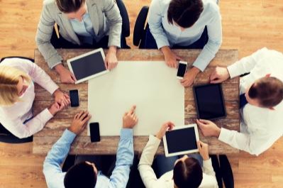 Office Overhead view of people in a meeting