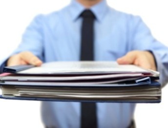 man-holding-papers