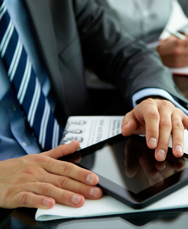 Man in suit with device