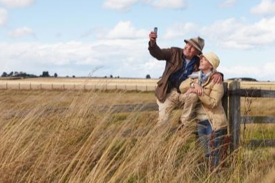 Field Couple taking a picture