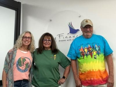 Jay Financial Team wearing Jimmy Buffet t-shirts