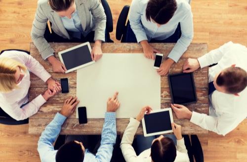 Office - Overhead view of people in a meeting