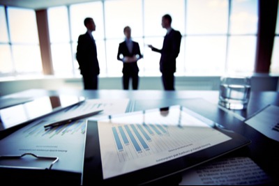 Three people consulting