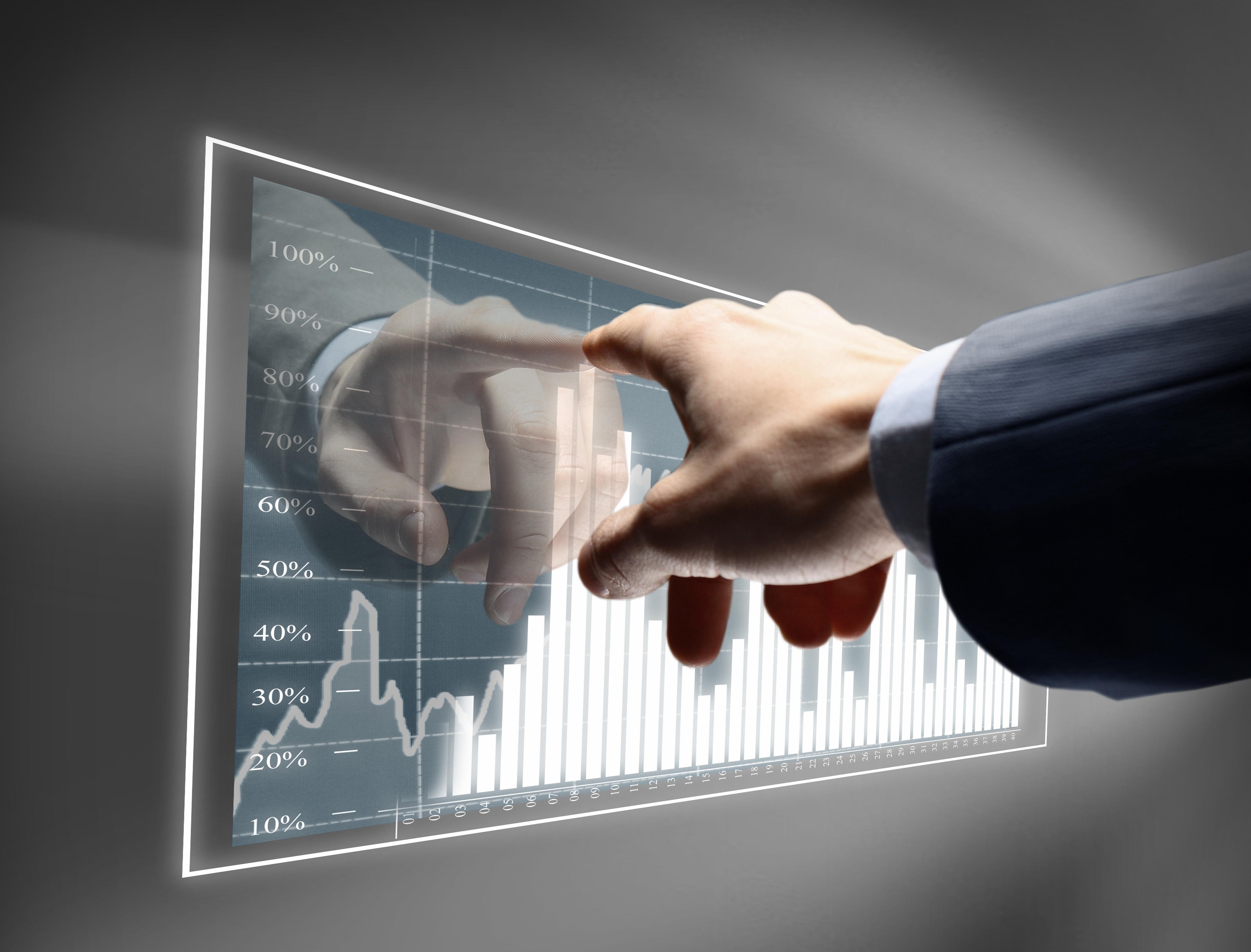 Man using interactive stock chart