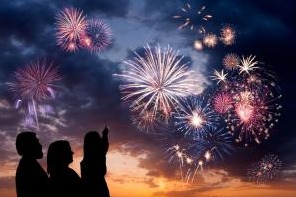 Family watching fireworks together