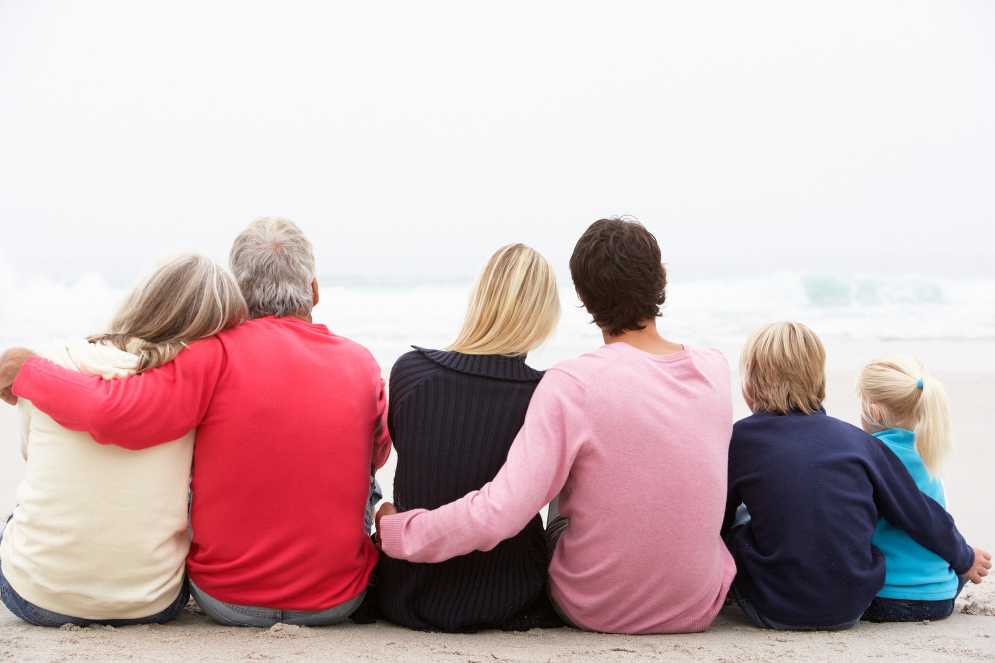 Three generations of a family sitting together