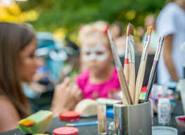 child with face paints