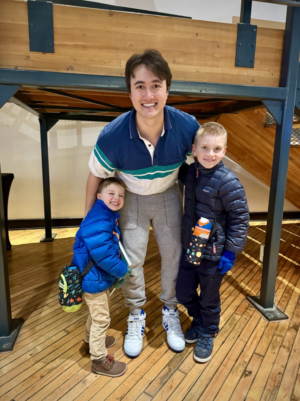 My two sons taking a photo with the actor who played Calvin