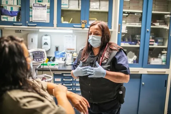 medic wearing gloves