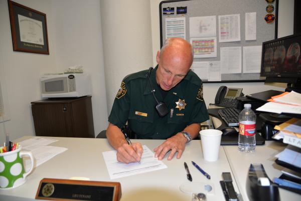 Officer at desk