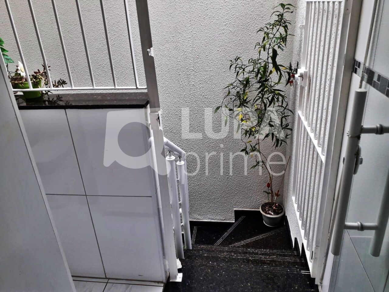 sobrado-venda-sao-paulo-tatuape-2dormitorios-2suites-3vagas-115m2-LM27205