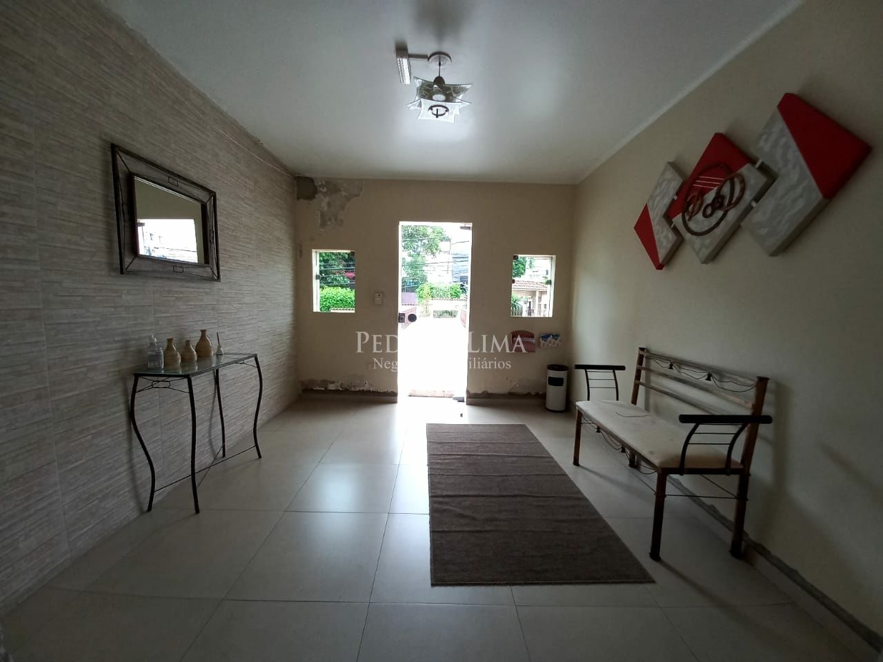 imagem do imovel Apartamento com 2 dormitórios, 1 sala, 1 cozinha, semi- mobiliado e 1 vaga coberta - Penha ref: PE33426