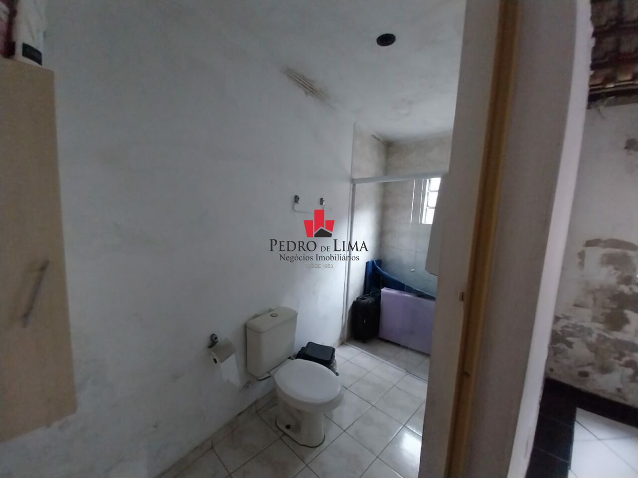 Terreno com 3 casas na Ponte Rasa