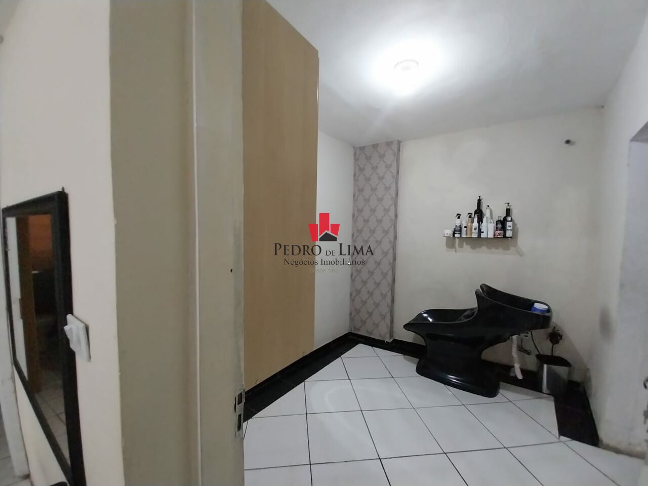 Terreno com 3 casas na Ponte Rasa