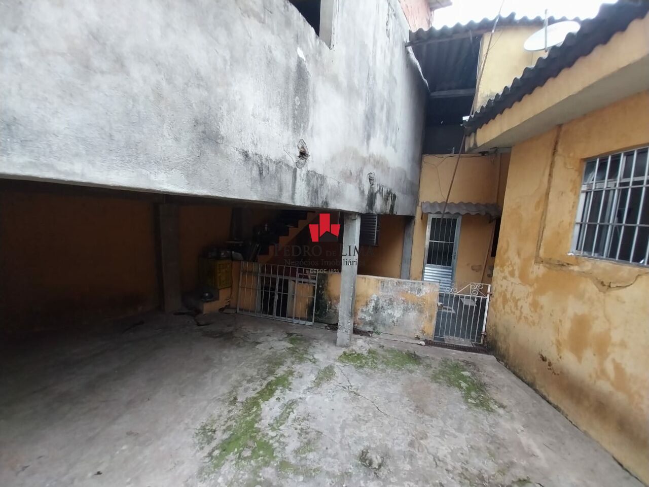 Terreno com 3 casas na Ponte Rasa