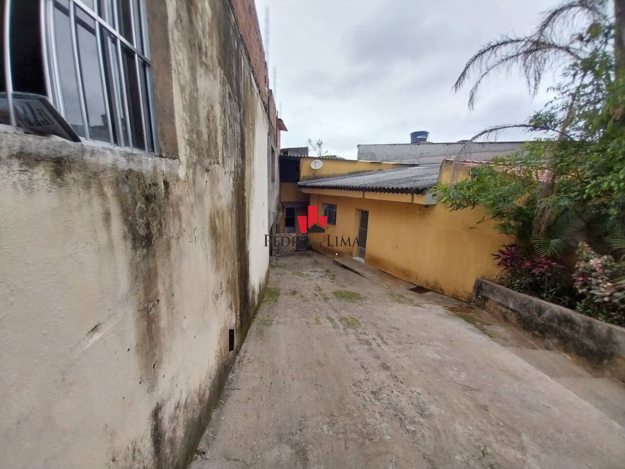 Terreno com 3 casas na Ponte Rasa