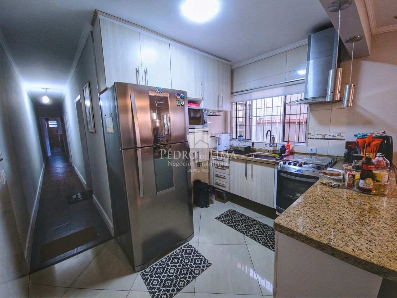 imagem do imovel Casa térrea com 3 dormitórios, sendo 2 suítes, 4 vagas de garagem, quintal e piscina na Penha. ref: PE41234
