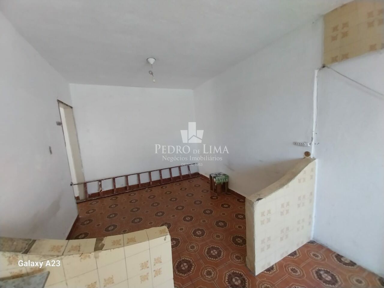 Terreno com 3 sobrados em Itaquera