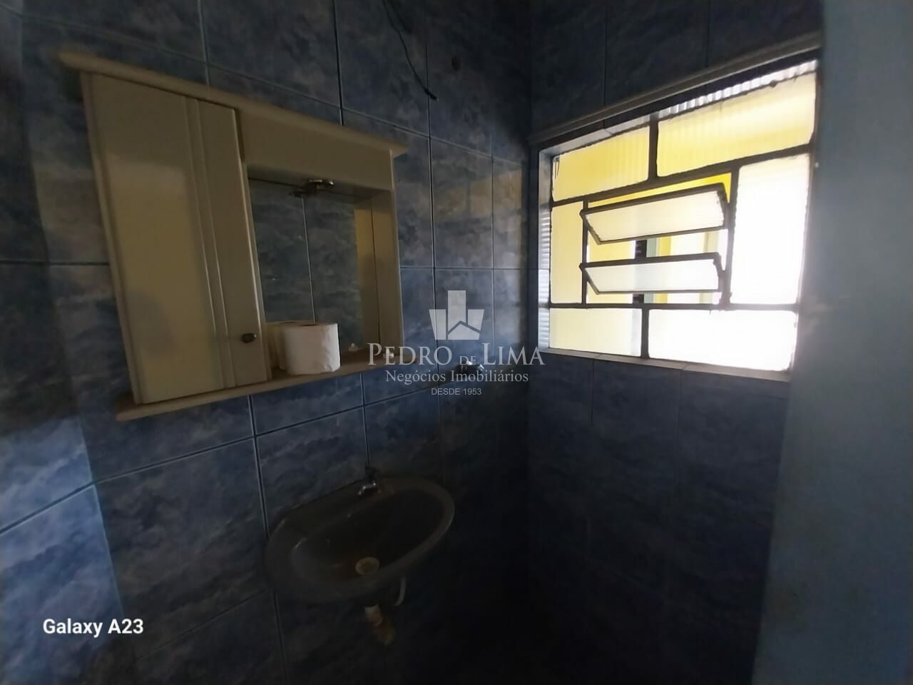 Terreno com 3 sobrados em Itaquera