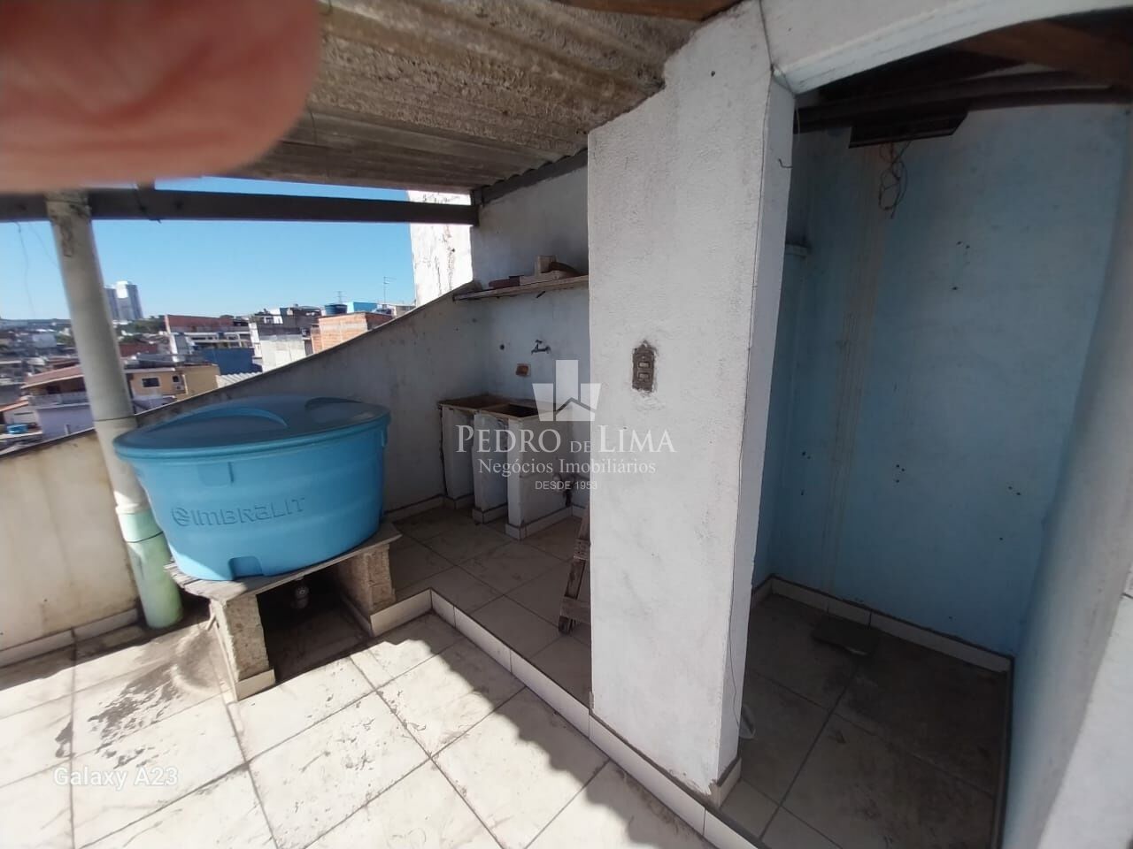 Terreno com 3 sobrados em Itaquera
