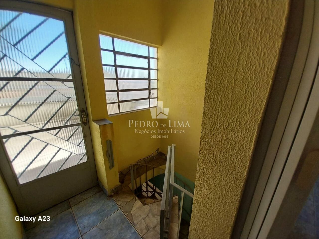 Terreno com 3 sobrados em Itaquera