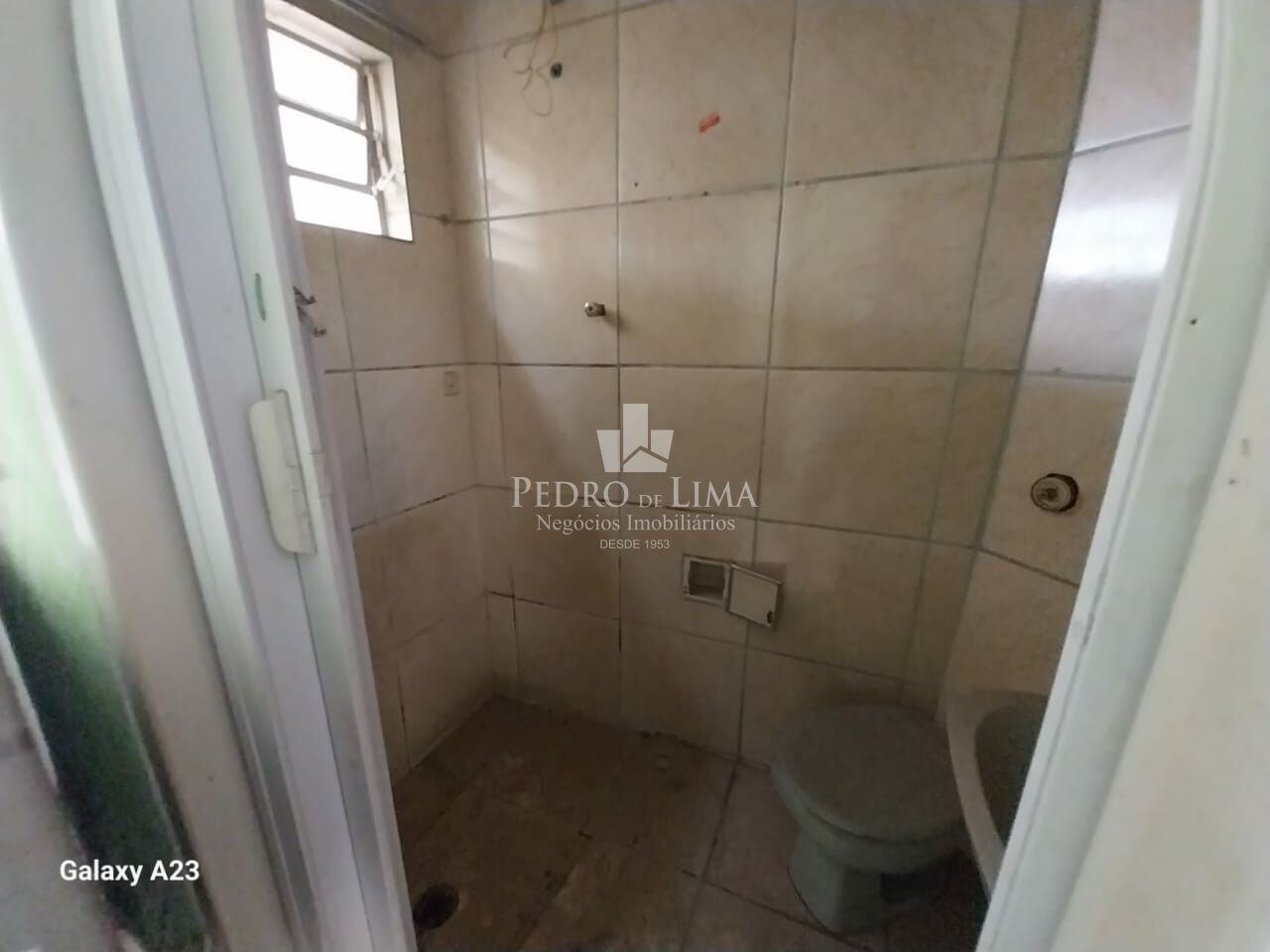 Terreno com 3 sobrados em Itaquera
