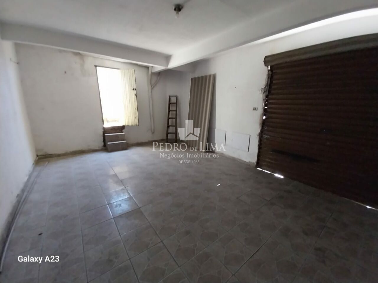 Terreno com 3 sobrados em Itaquera