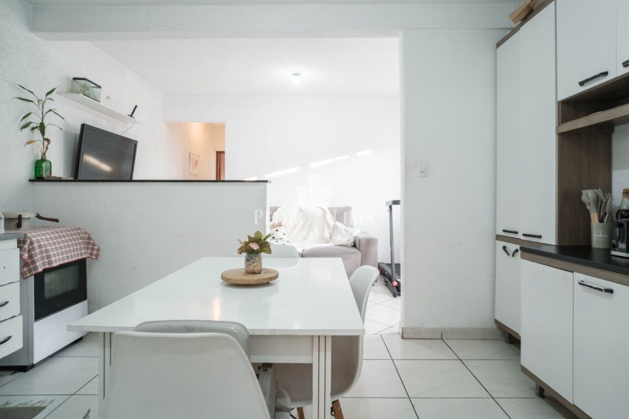 Terreno com 5 casas para renda no Engenheiro Goulart