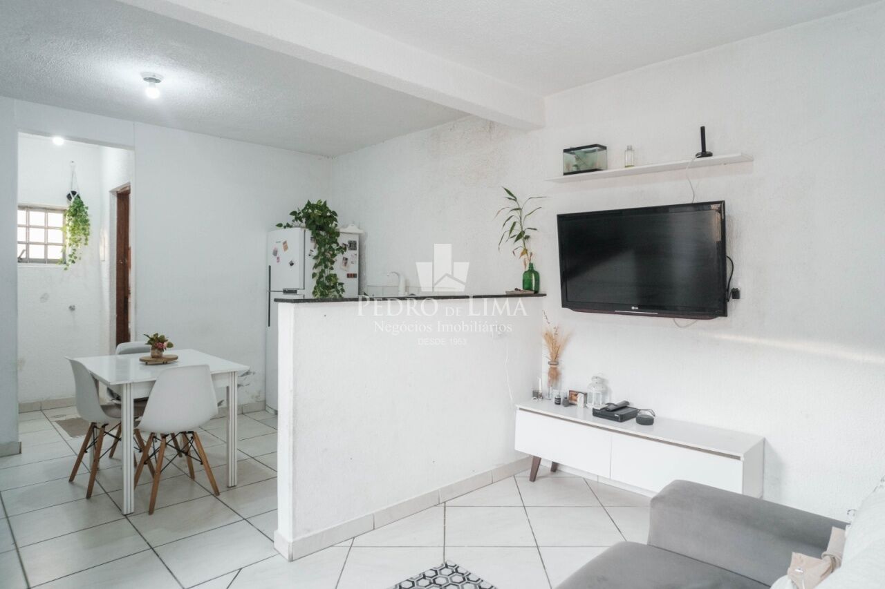 Terreno com 5 casas para renda no Engenheiro Goulart