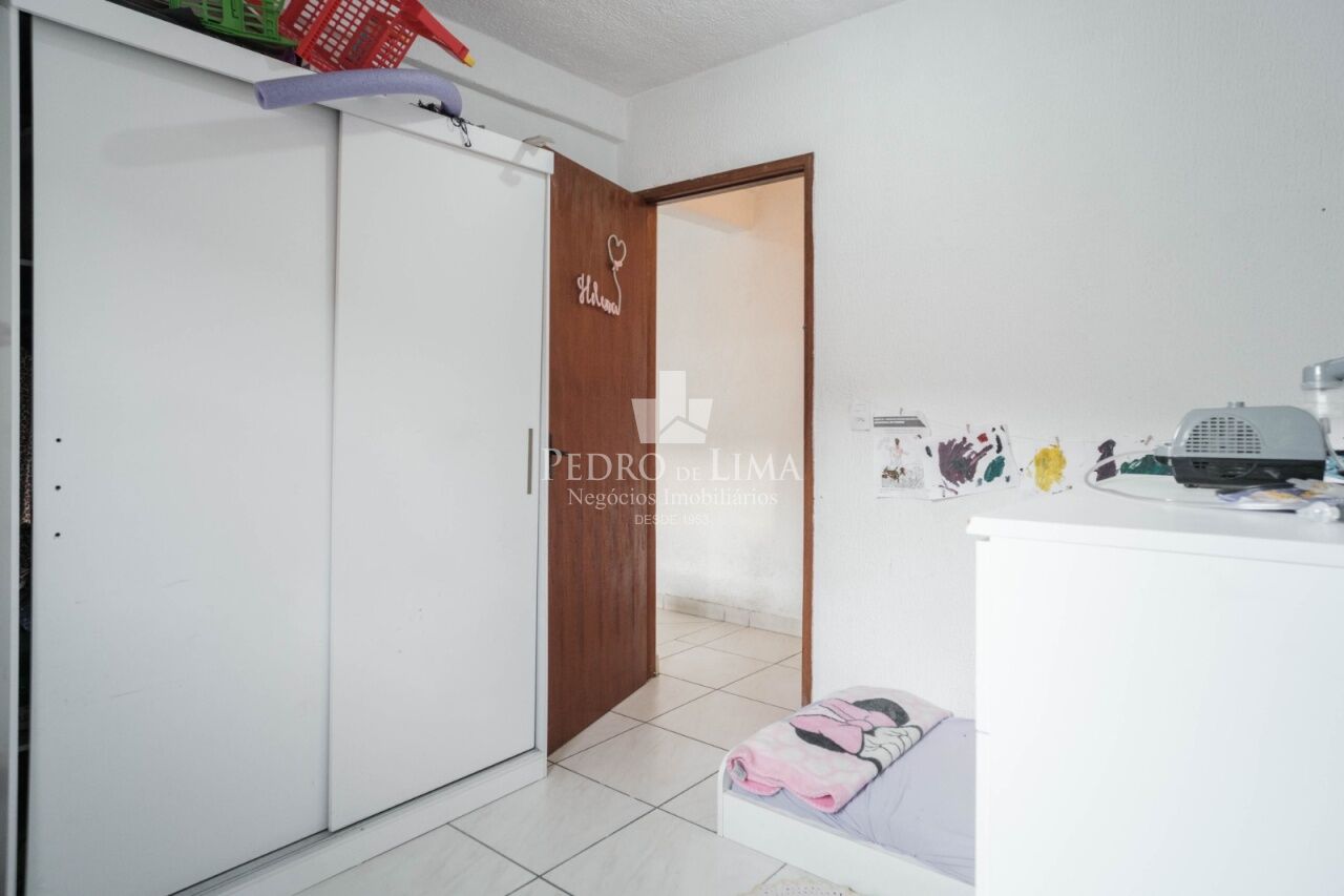 Terreno com 5 casas para renda no Engenheiro Goulart