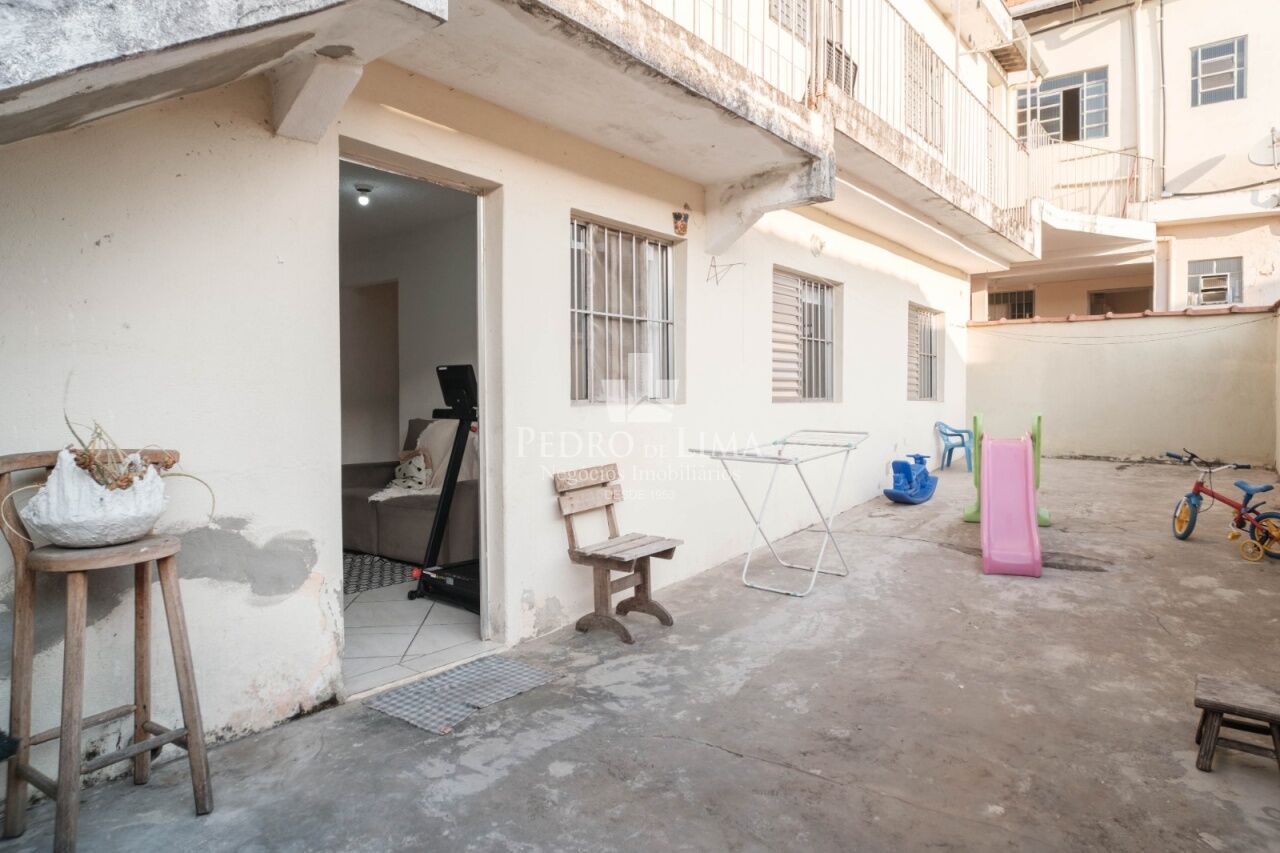 Terreno com 5 casas para renda no Engenheiro Goulart