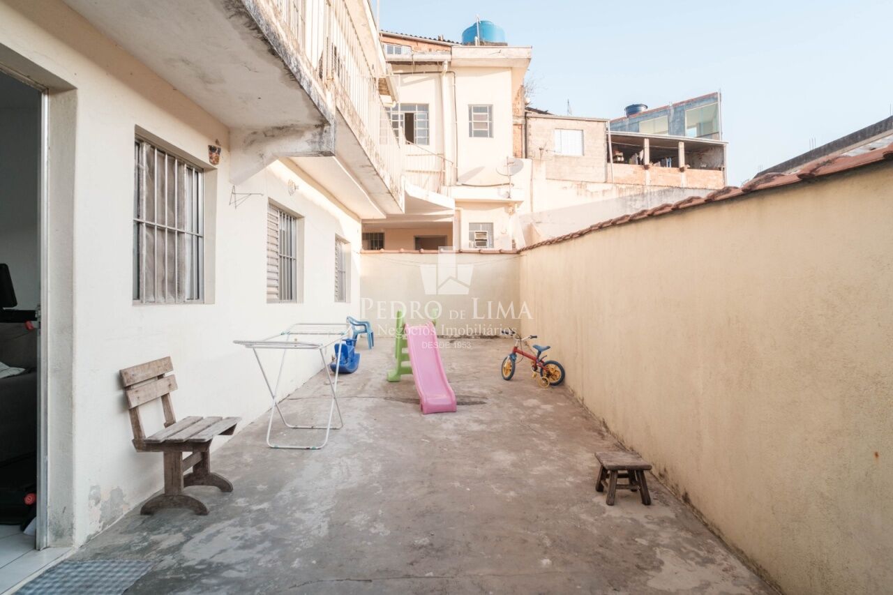 Terreno com 5 casas para renda no Engenheiro Goulart