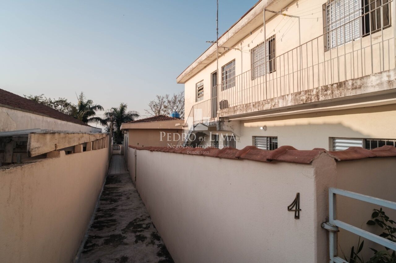 Terreno com 5 casas para renda no Engenheiro Goulart