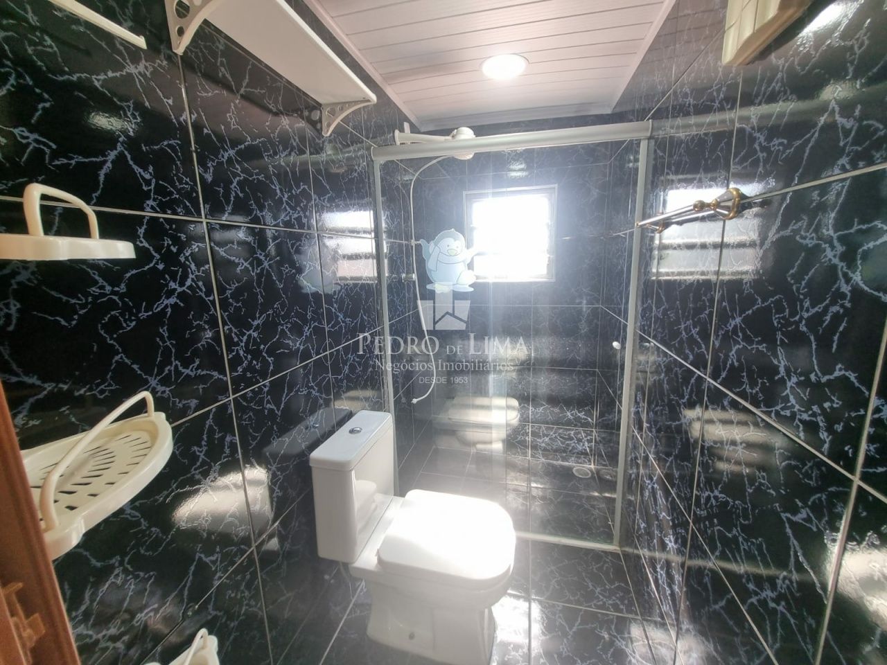 Casa Térrea com 2 dormitórios, sala, cozinha, banheiro, área de serviço, 1 vaga - Região Penha