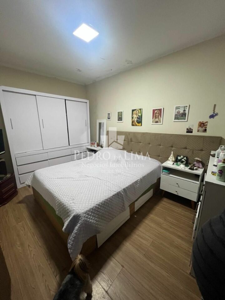 Terreno com duas casas na Penha
