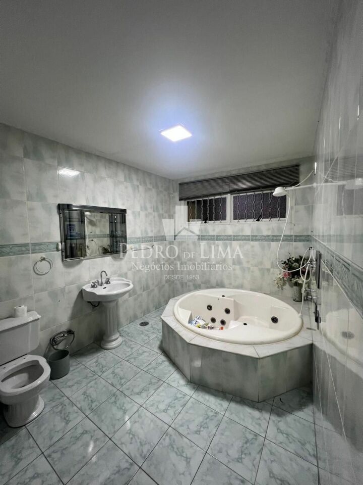 Terreno com duas casas na Penha
