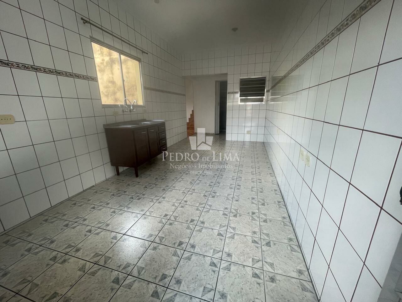 Casa Assobrada com 2 dormitórios e vaga de garagem na região da Penha 