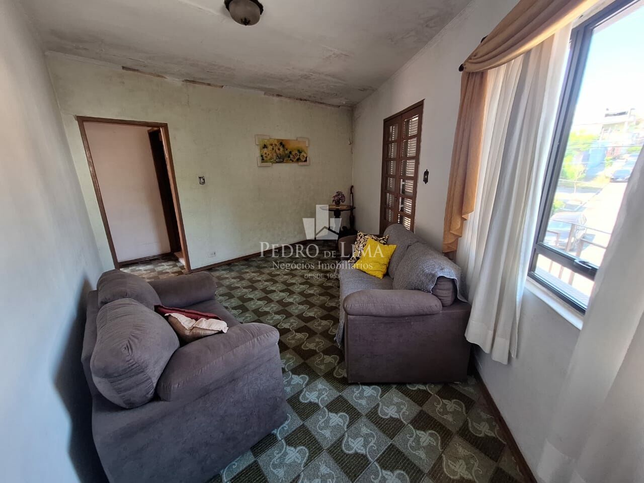 Salão comercial com 3 casas residenciais na Penha